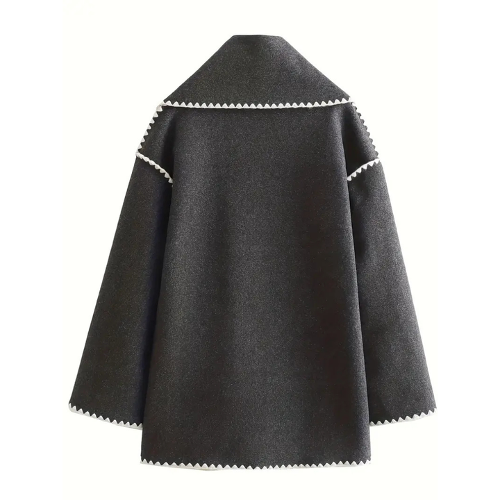Cappotto esclusivo con accento di sciarpa
