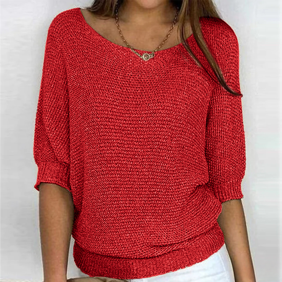 Elegante maglione lavorato a maglia a trecce