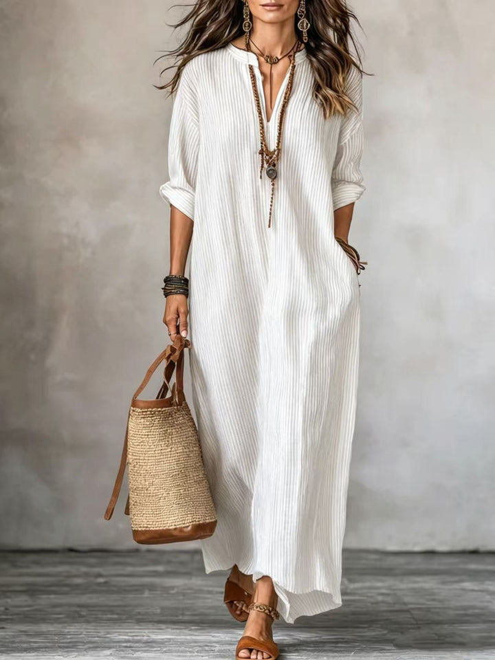 HAVEN | Maxi abito a maniche lunghe con scollo a V, stile a righe e tasche laterali
