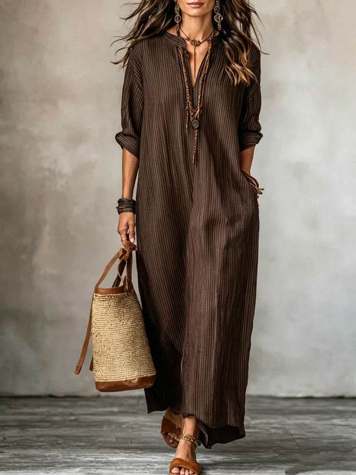 HAVEN | Maxi abito a maniche lunghe con scollo a V, stile a righe e tasche laterali