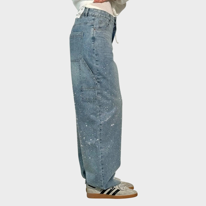 Zoe - Jeans a gamba larga con dettagli gioiello