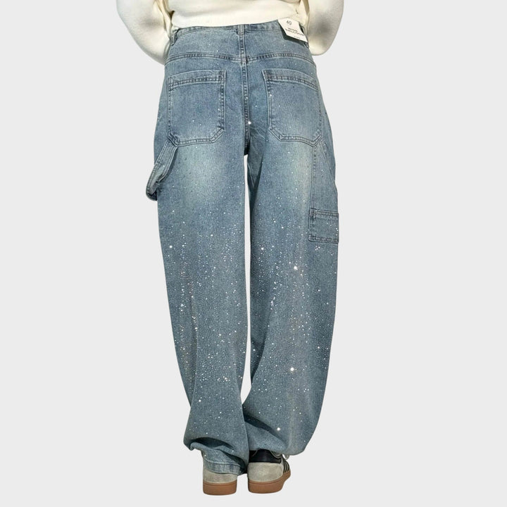 Zoe - Jeans a gamba larga con dettagli gioiello