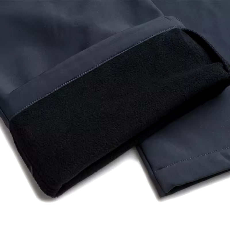 Pantaloni antivento