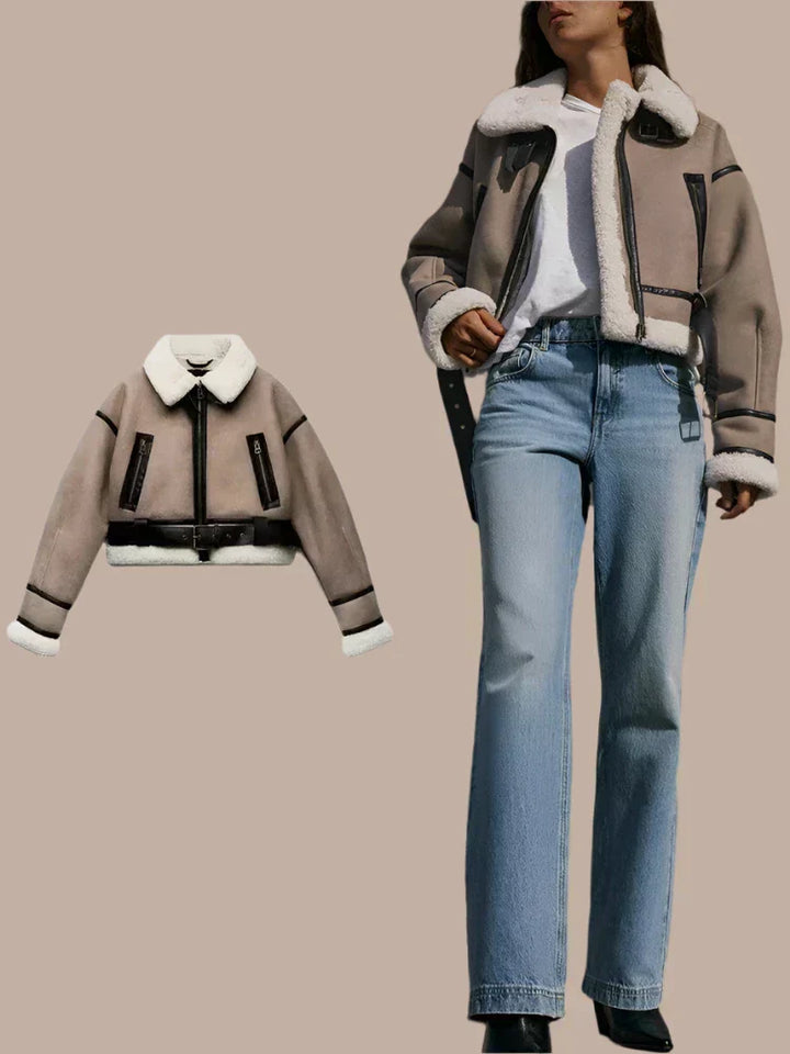 Giacca in pelle alla moda con rifiniture in pelliccia