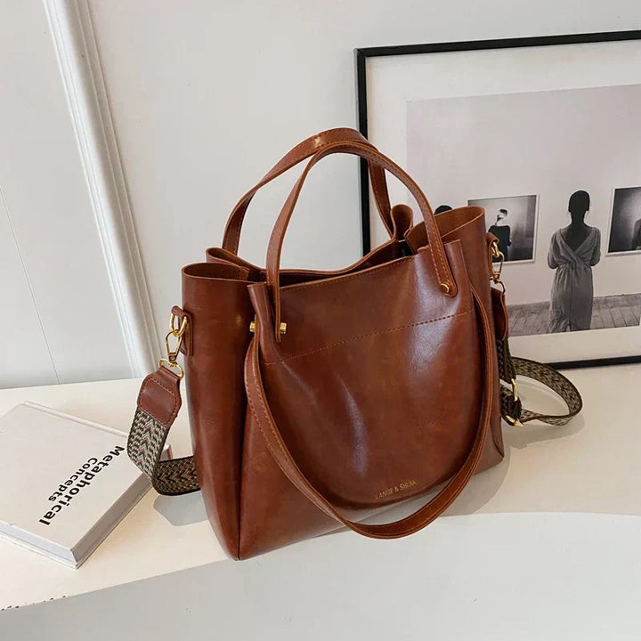 Borsa elegante con due tracolle