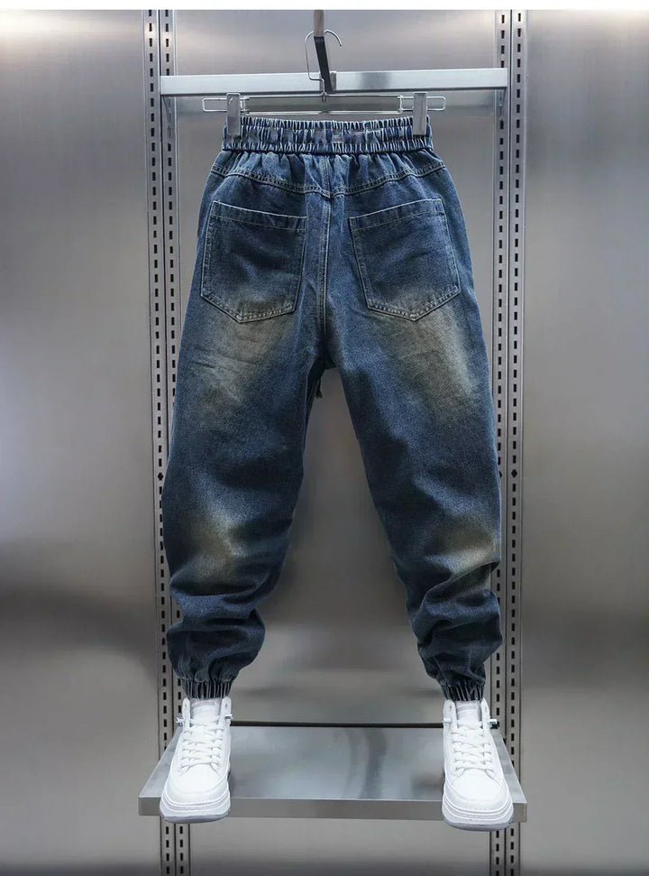 Pantaloni larghi in denim con cintura