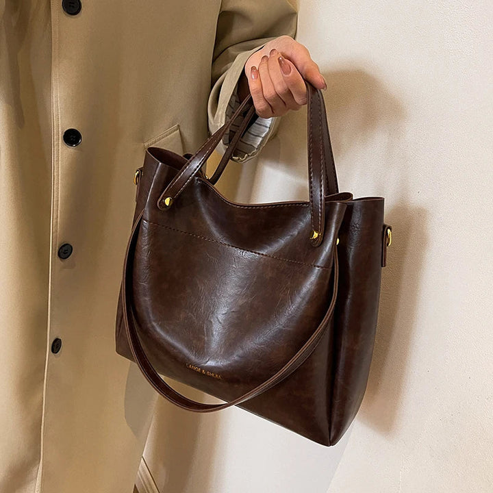 Borsa elegante con due tracolle