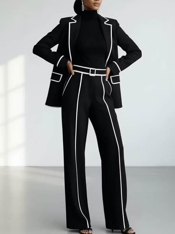 Completo due pezzi con blazer a contrasto con piping e pantaloni a gamba larga neri