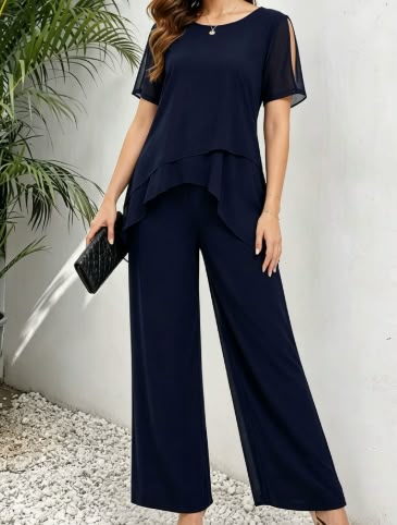 Completo pantalone in chiffon con apertura a goccia e dettagli decorativi