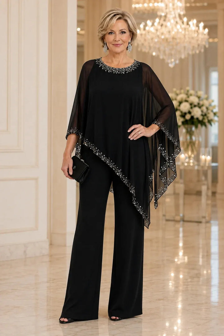 Completo elegante con pantaloni a gamba larga e mantella in chiffon con perline