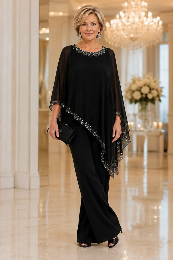 Completo elegante con pantaloni a gamba larga e mantella in chiffon con perline