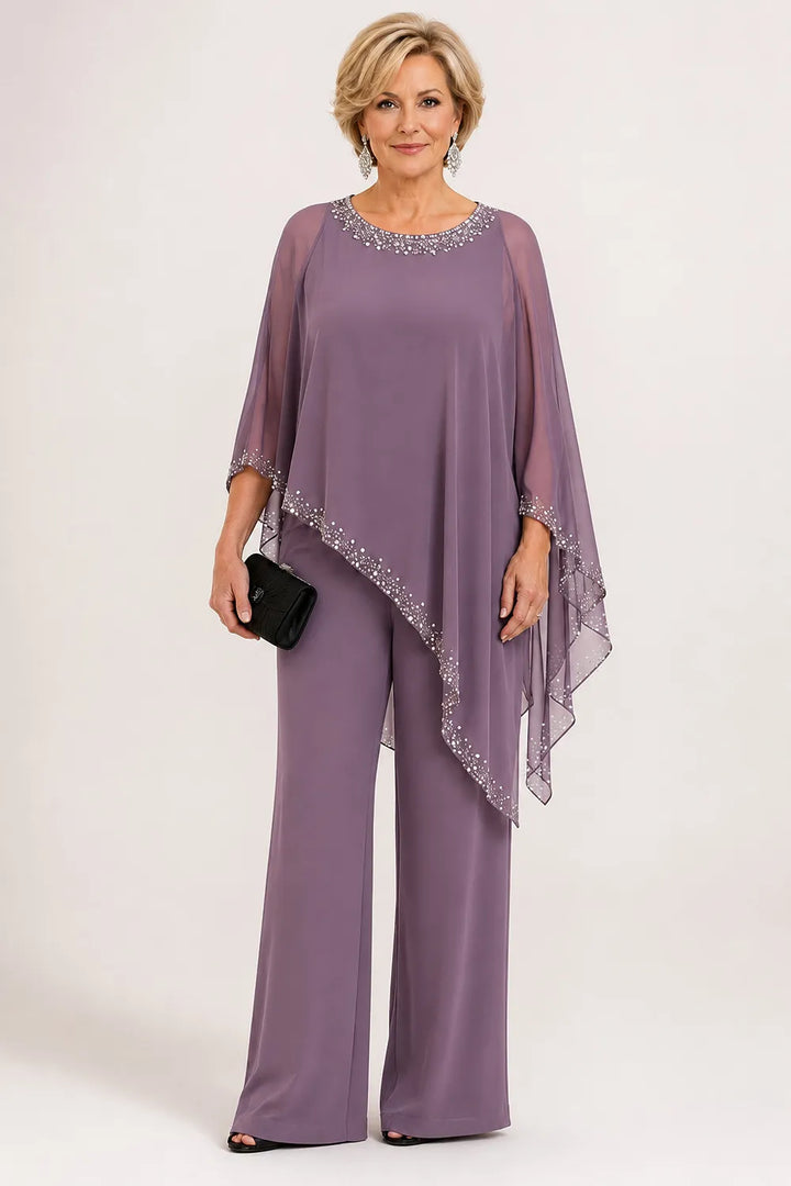 Completo elegante con pantaloni a gamba larga e mantella in chiffon con perline