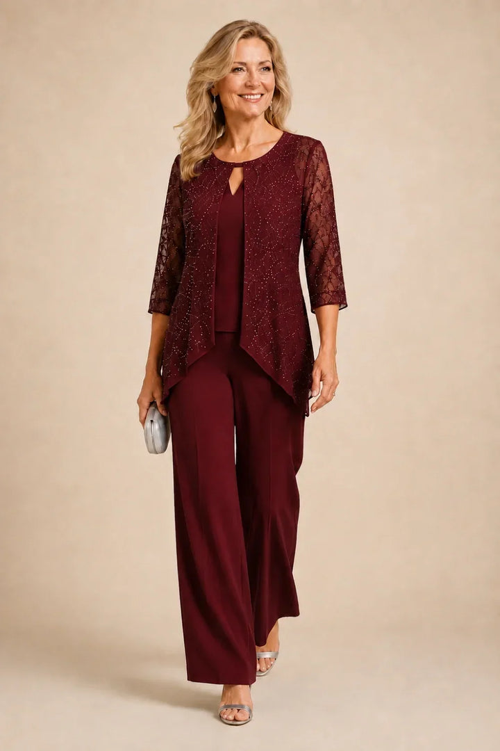 Completo pantalone a gamba larga con strati di pizzo e perline