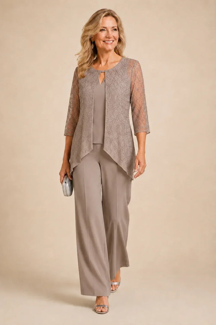 Completo pantalone a gamba larga con strati di pizzo e perline