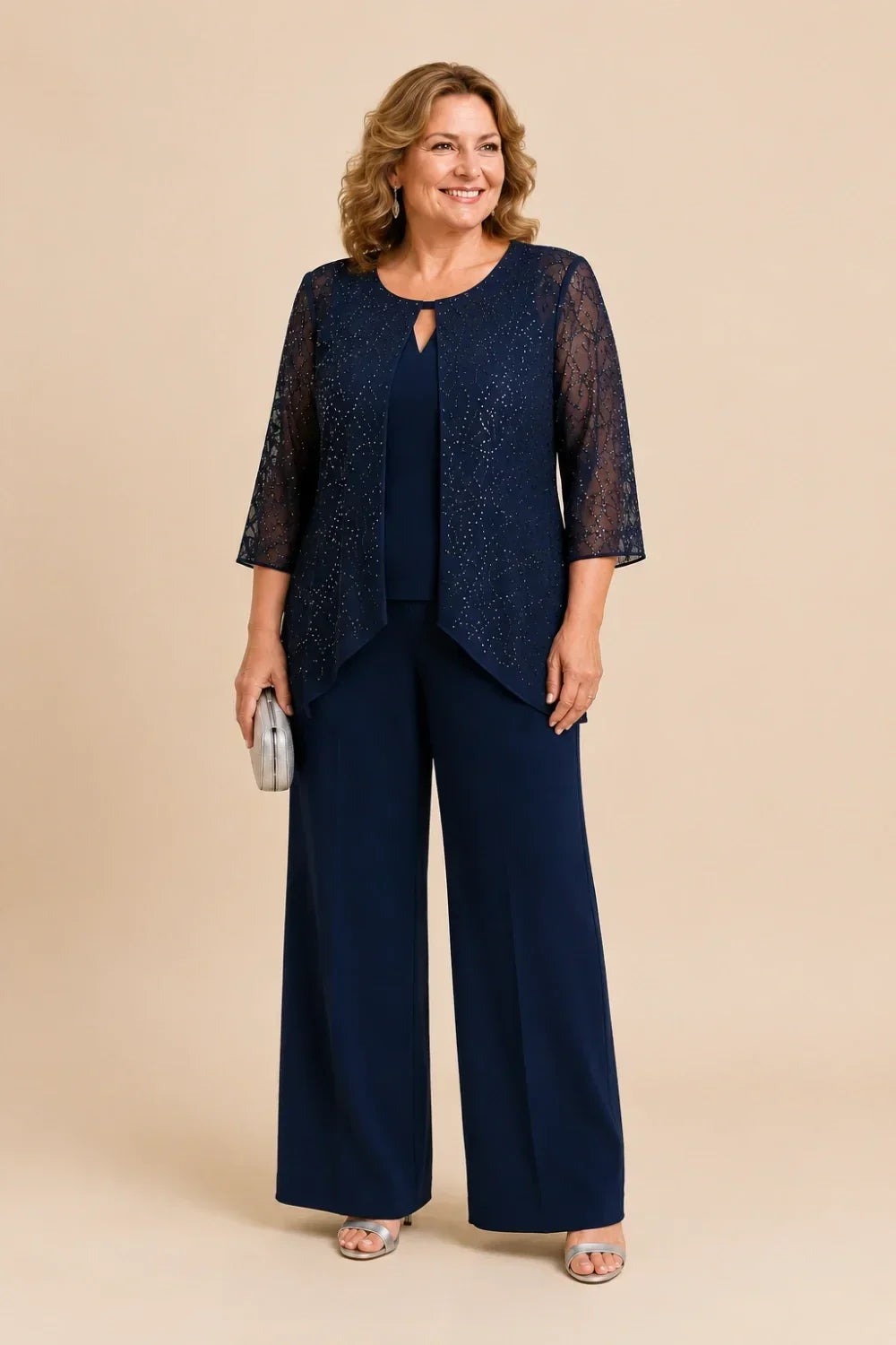 Completo pantalone a gamba larga con strati di pizzo e perline