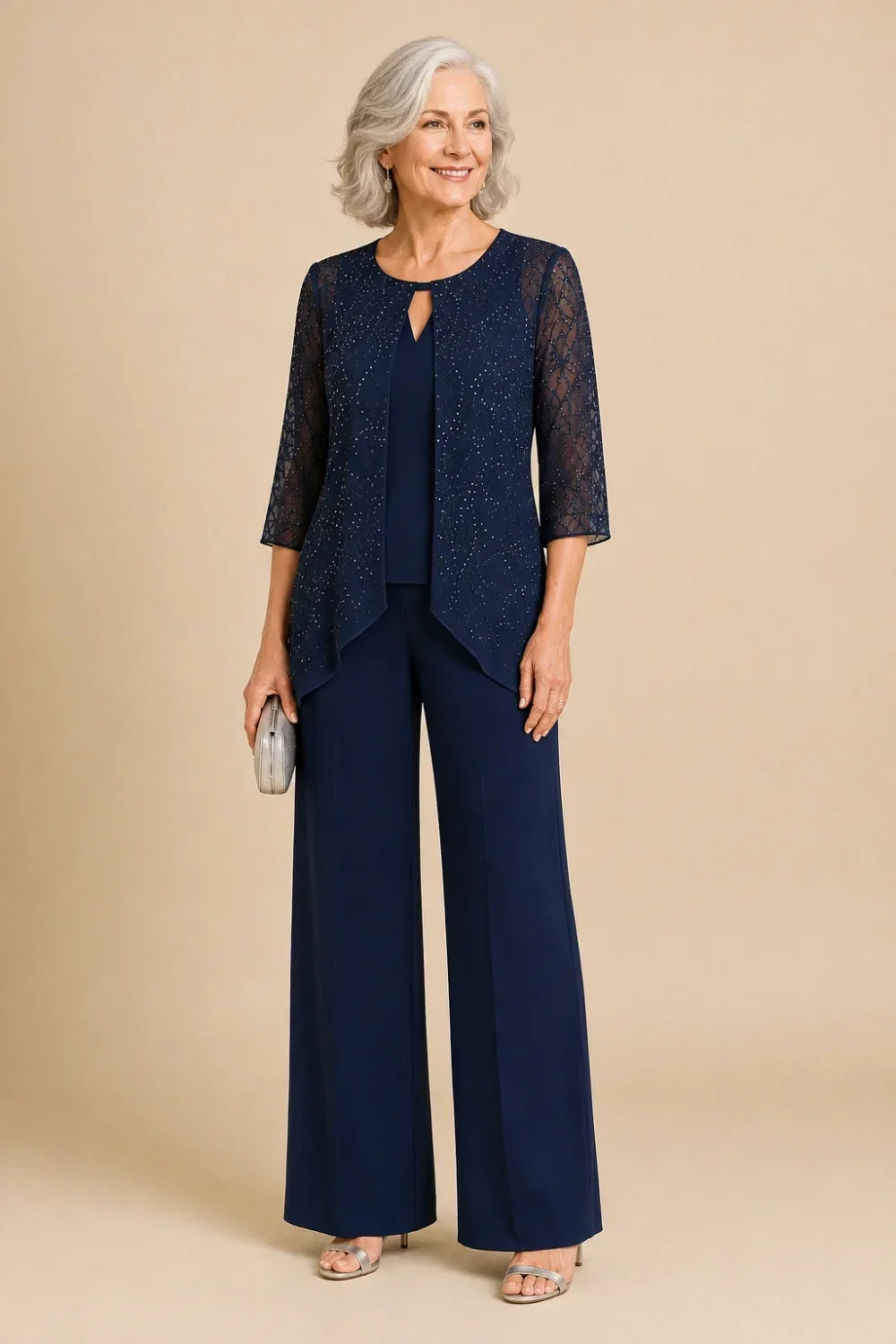 Completo pantalone a gamba larga con strati di pizzo e perline
