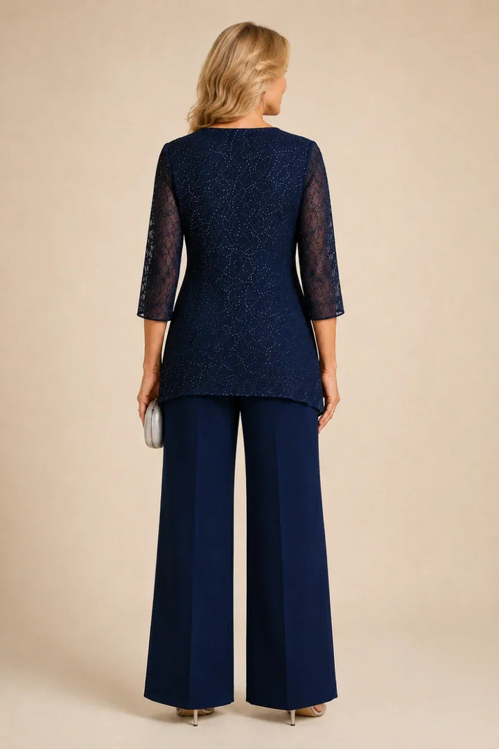 Completo pantalone a gamba larga con strati di pizzo e perline