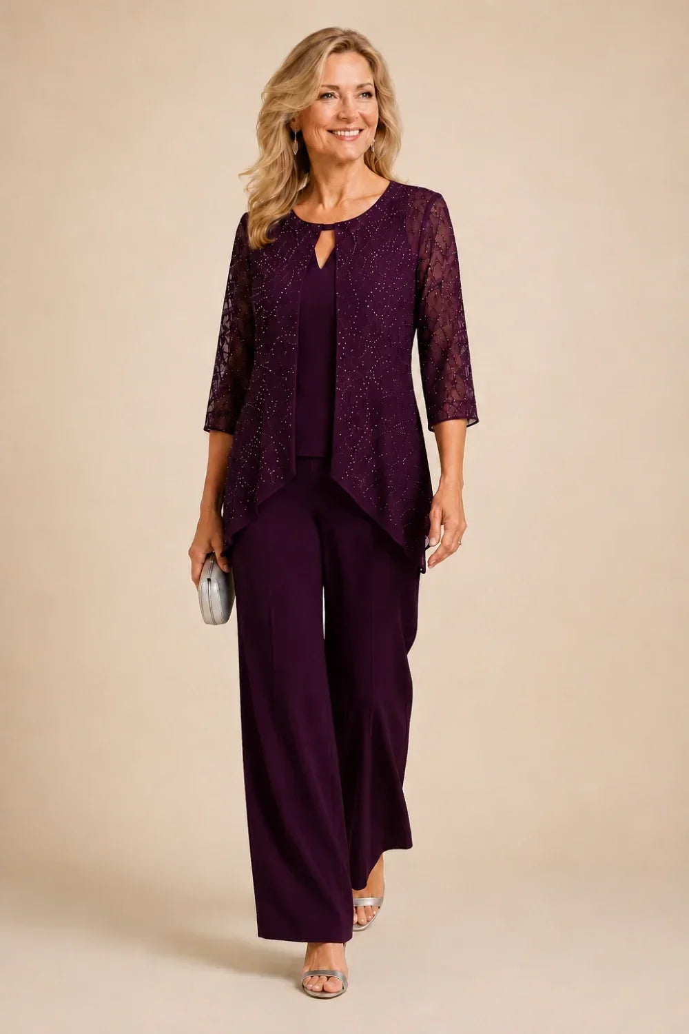 Completo pantalone a gamba larga con strati di pizzo e perline