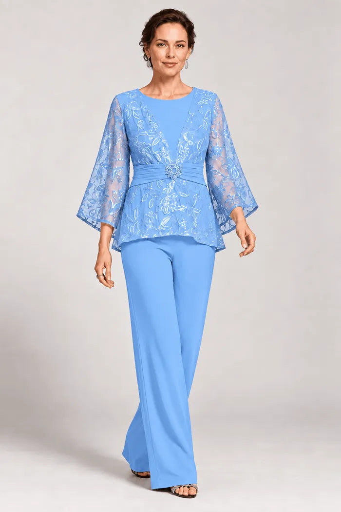 Completo pantalone da sera con maniche a campana velate e decorazioni