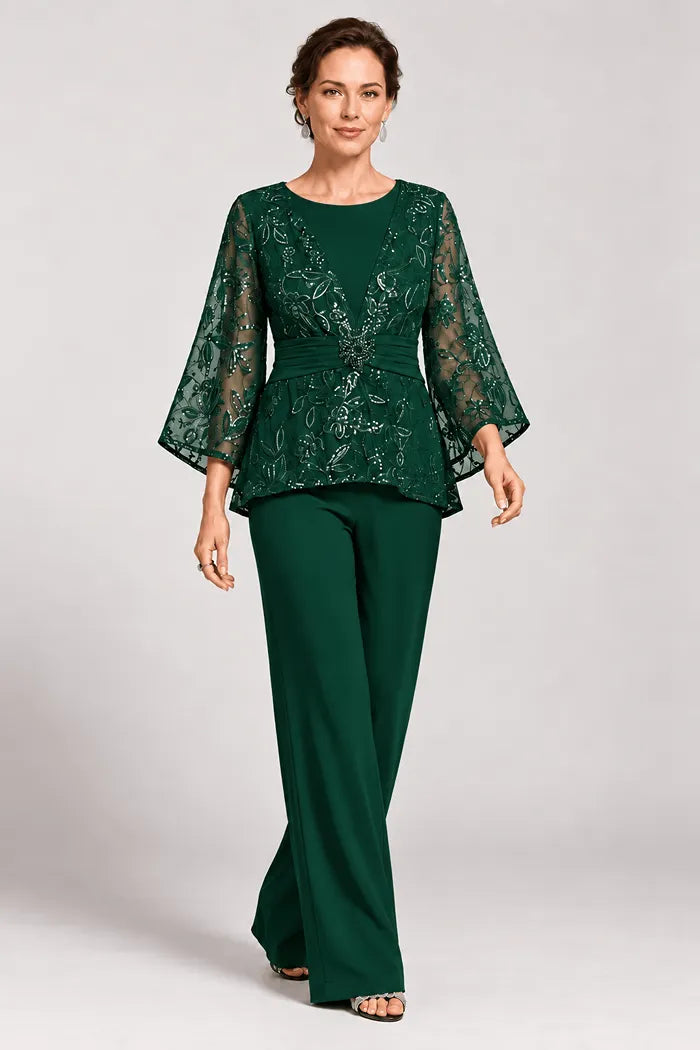 Completo pantalone da sera con maniche a campana velate e decorazioni