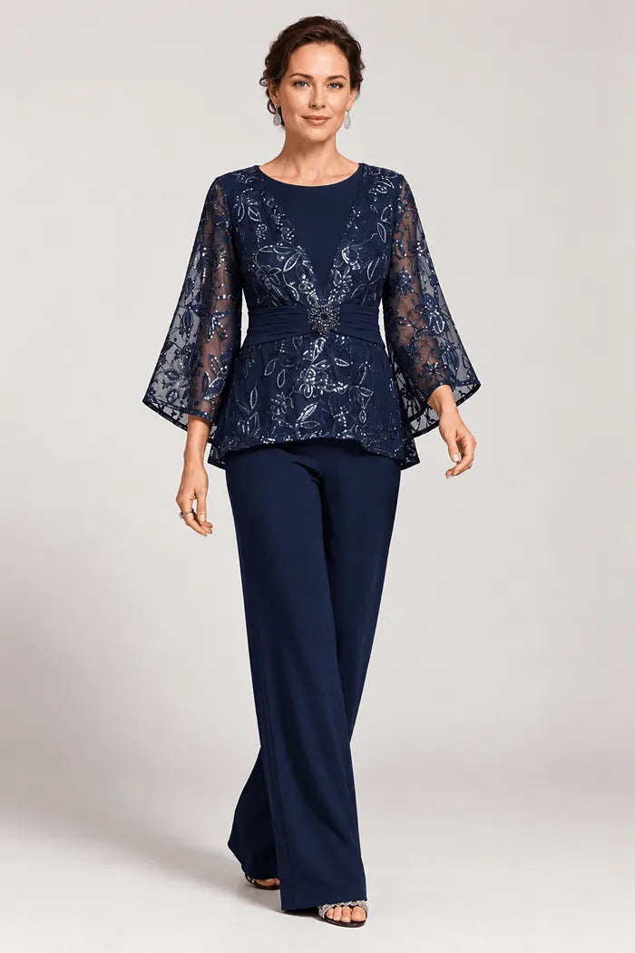 Completo pantalone da sera con maniche a campana velate e decorazioni
