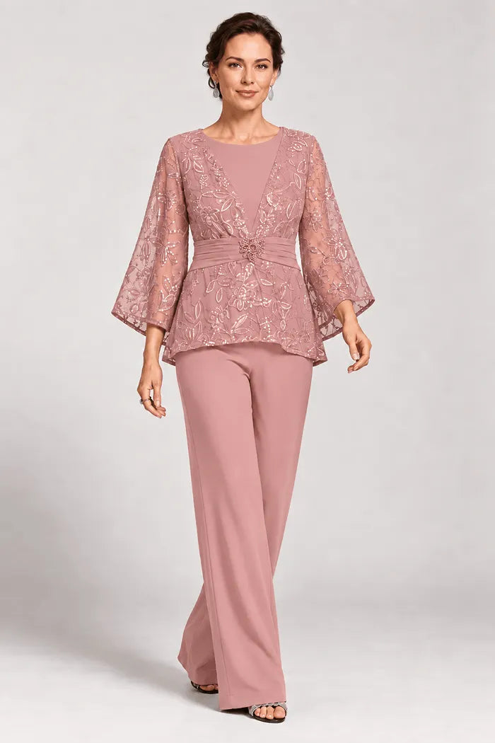 Completo pantalone da sera con maniche a campana velate e decorazioni