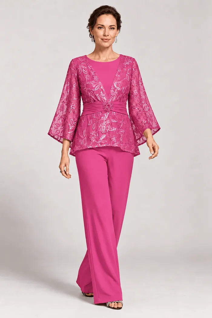 Completo pantalone da sera con maniche a campana velate e decorazioni
