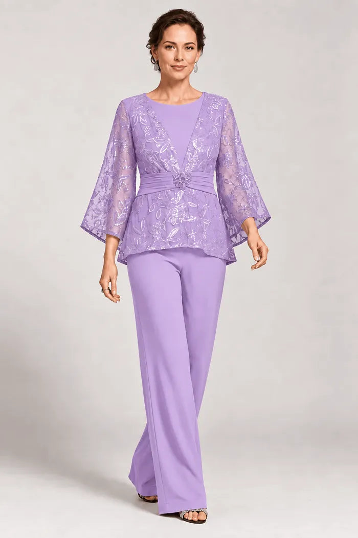 Completo pantalone da sera con maniche a campana velate e decorazioni