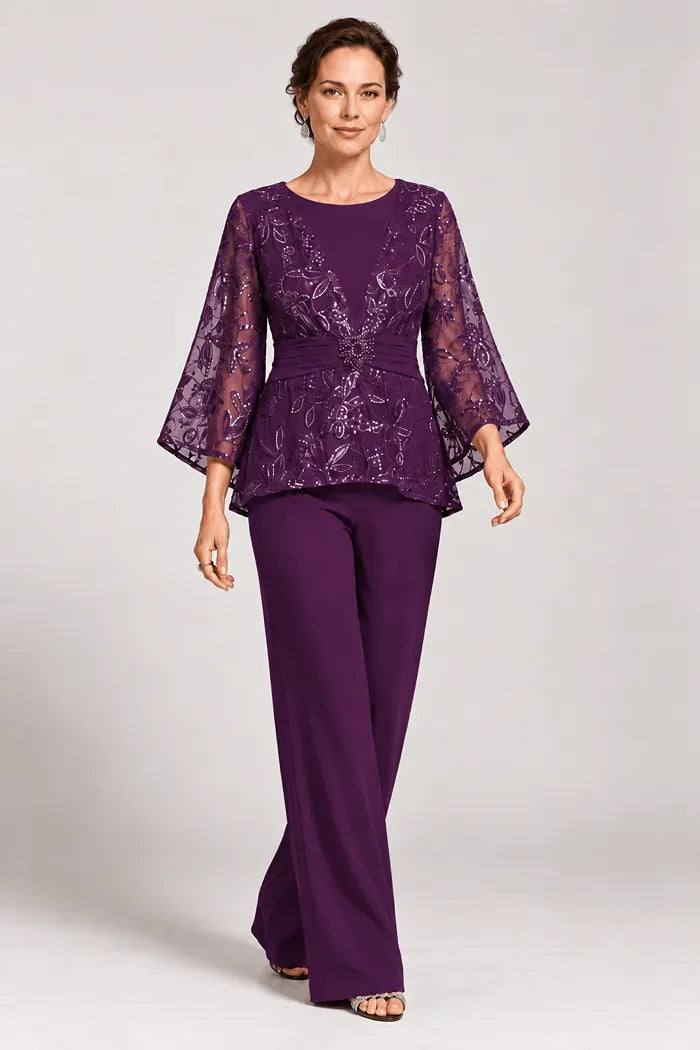 Completo pantalone da sera con maniche a campana velate e decorazioni