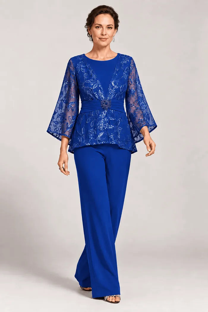 Completo pantalone da sera con maniche a campana velate e decorazioni