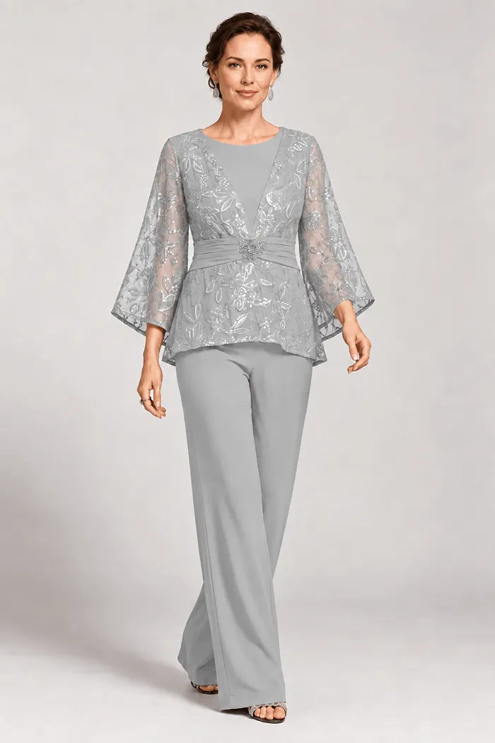 Completo pantalone da sera con maniche a campana velate e decorazioni