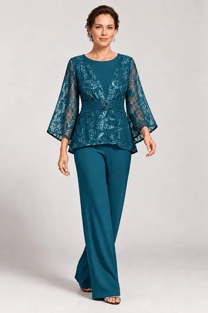 Completo pantalone da sera con maniche a campana velate e decorazioni