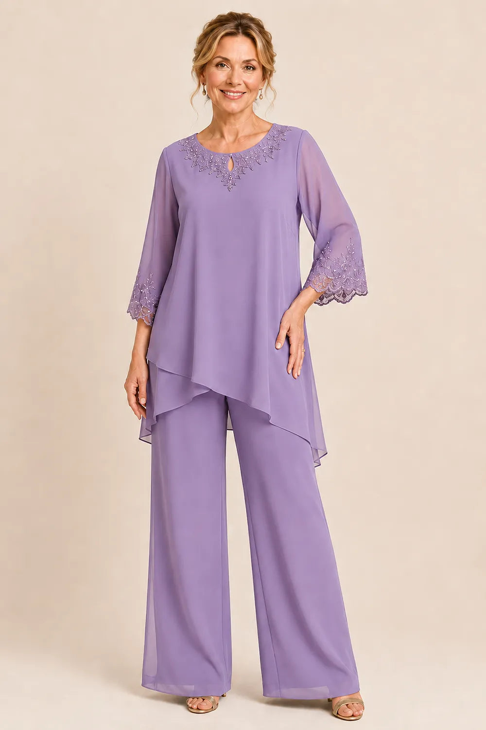 Elegante completo formale a due pezzi con pantaloni e ricami
