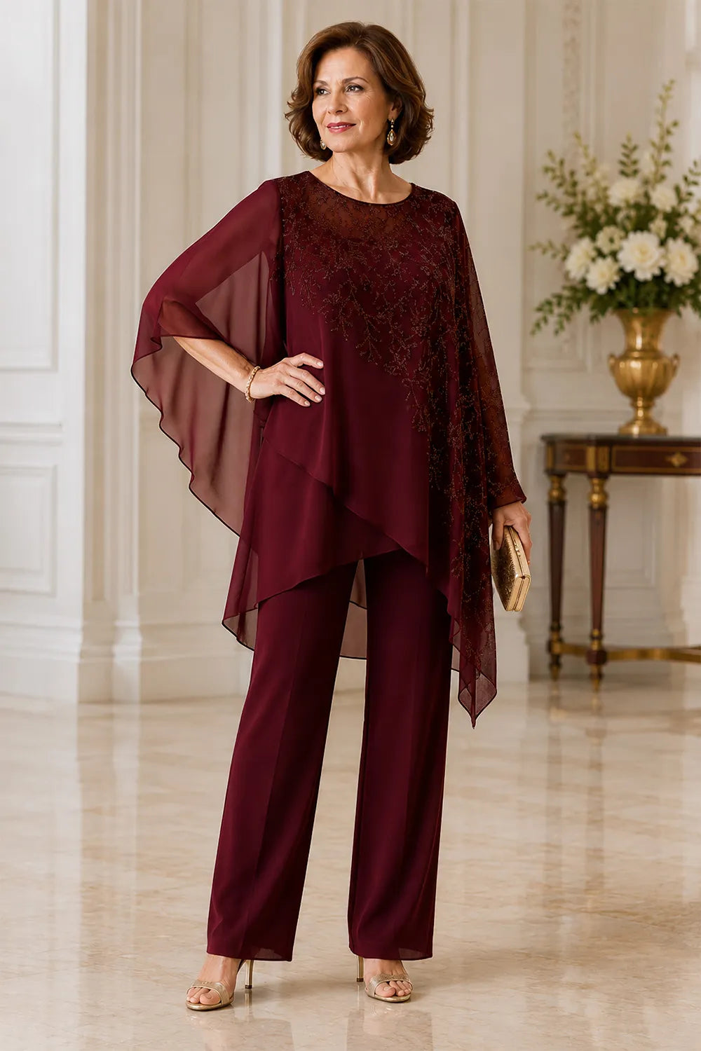 Completo pantalone da cerimonia per madre della sposa con sovrapposizione in chiffon ricamato