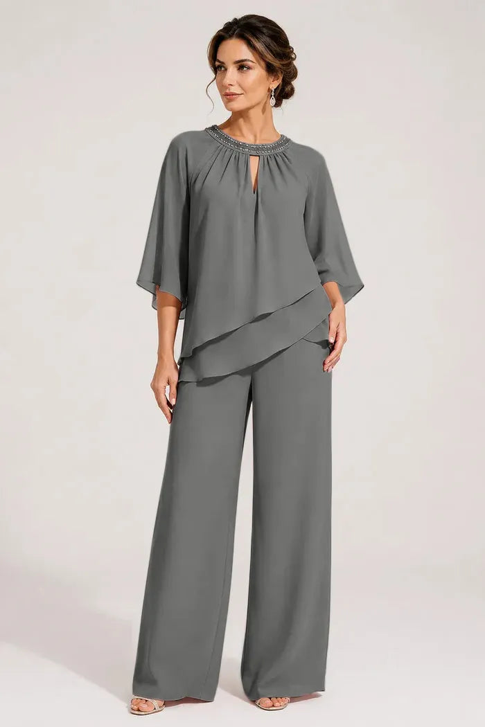 Elegante completo pantalone formale con scollo a goccia