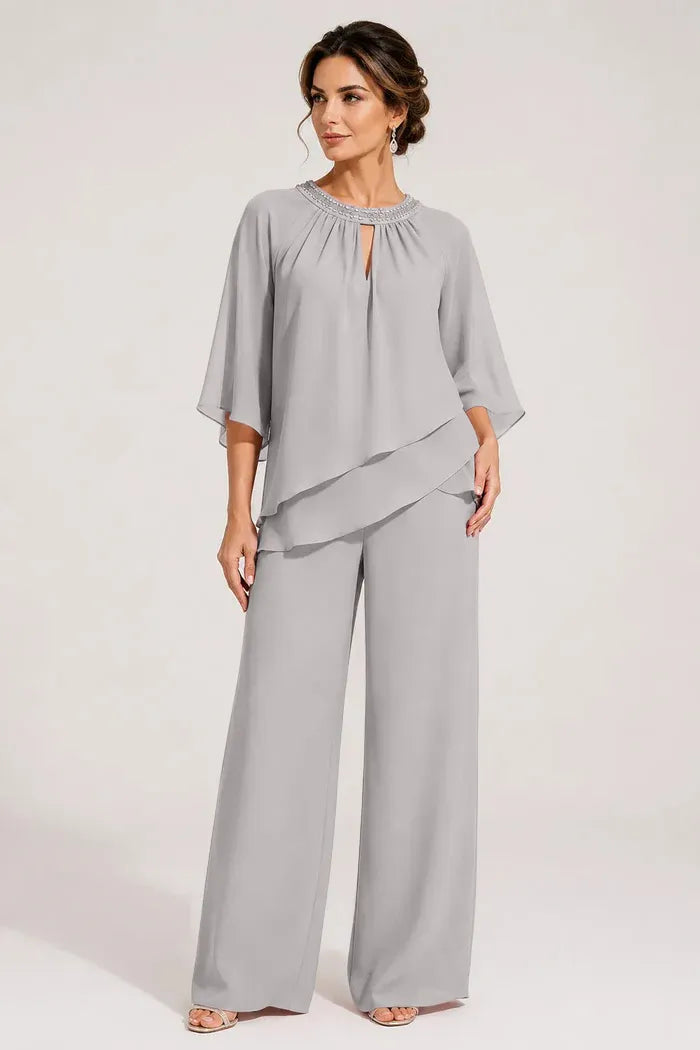 Elegante completo pantalone formale con scollo a goccia