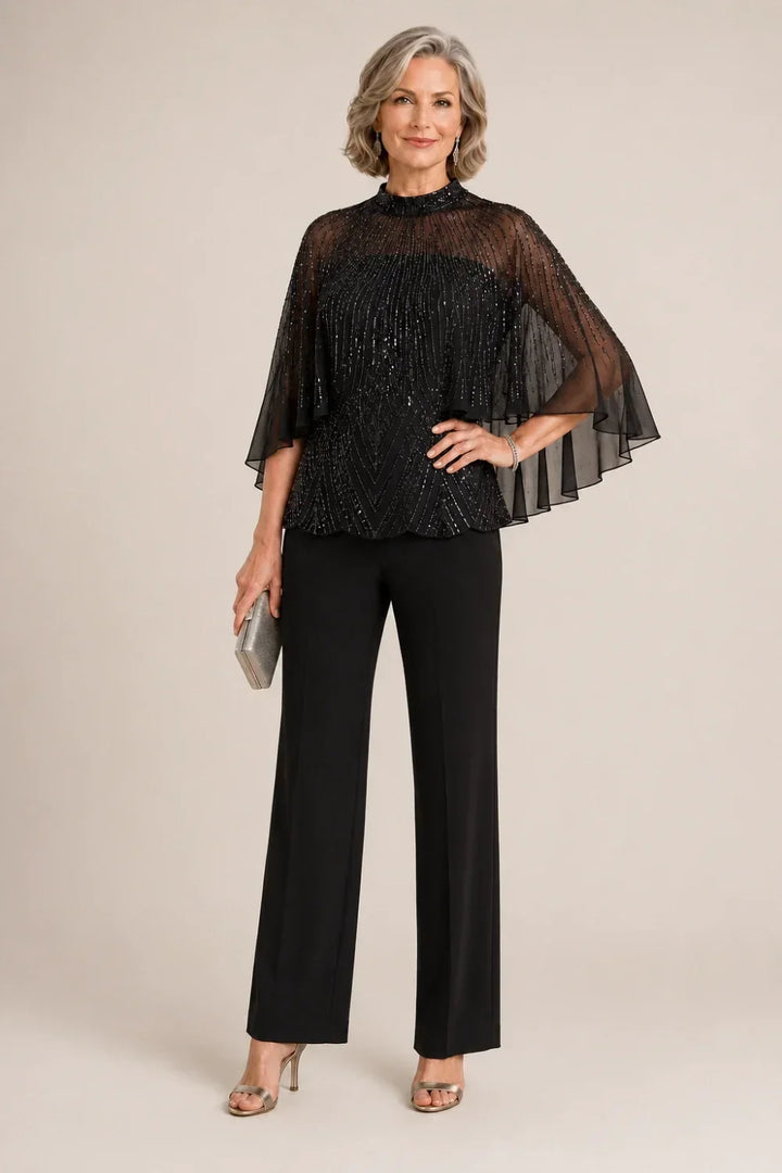 Completo pantalone con cappa in mesh di paillettes e collo alto