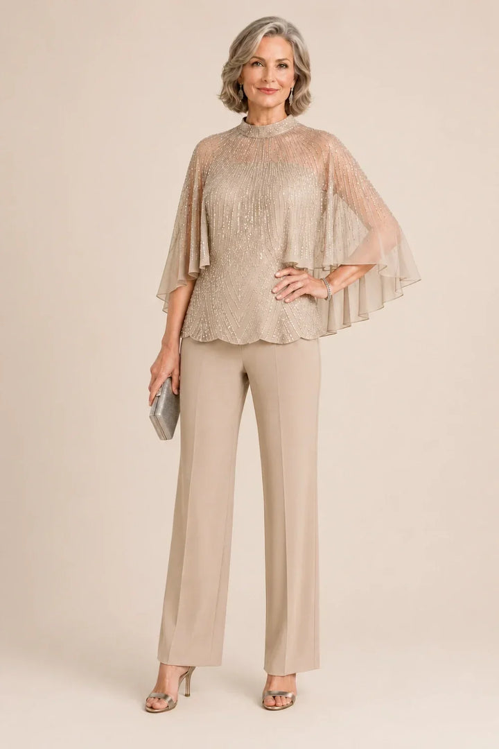 Completo pantalone con cappa in mesh di paillettes e collo alto