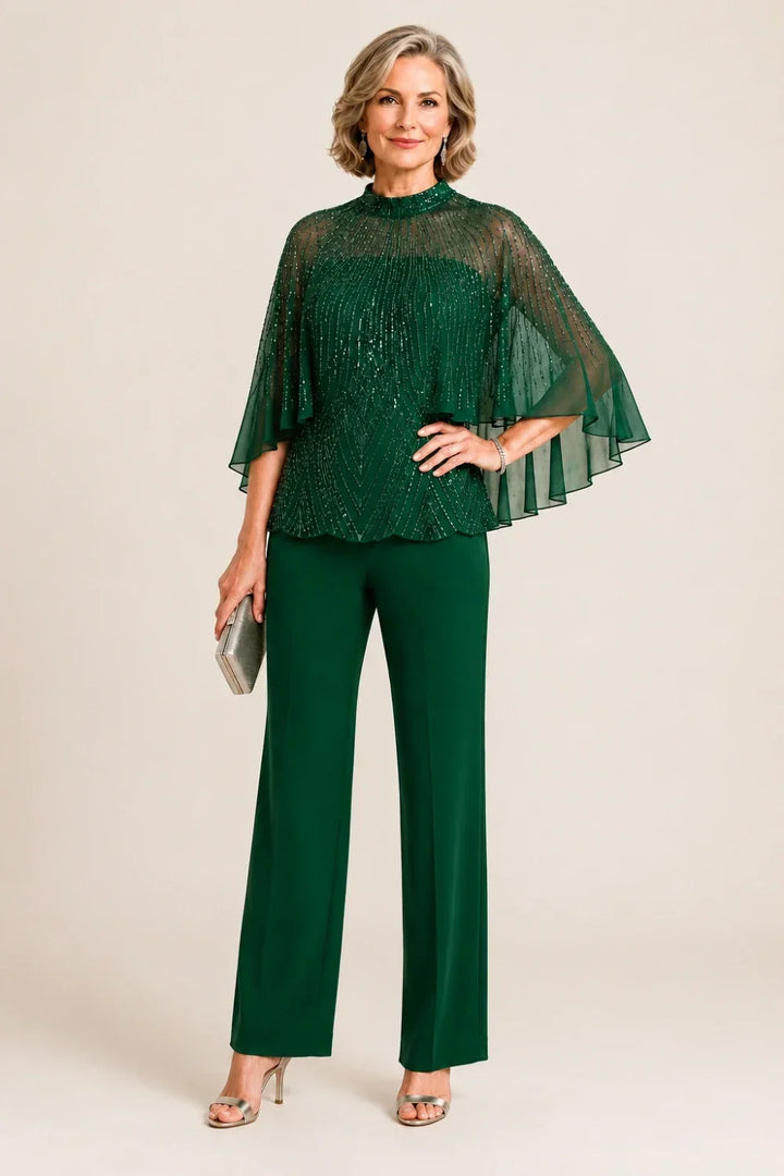 Completo pantalone con cappa in mesh di paillettes e collo alto