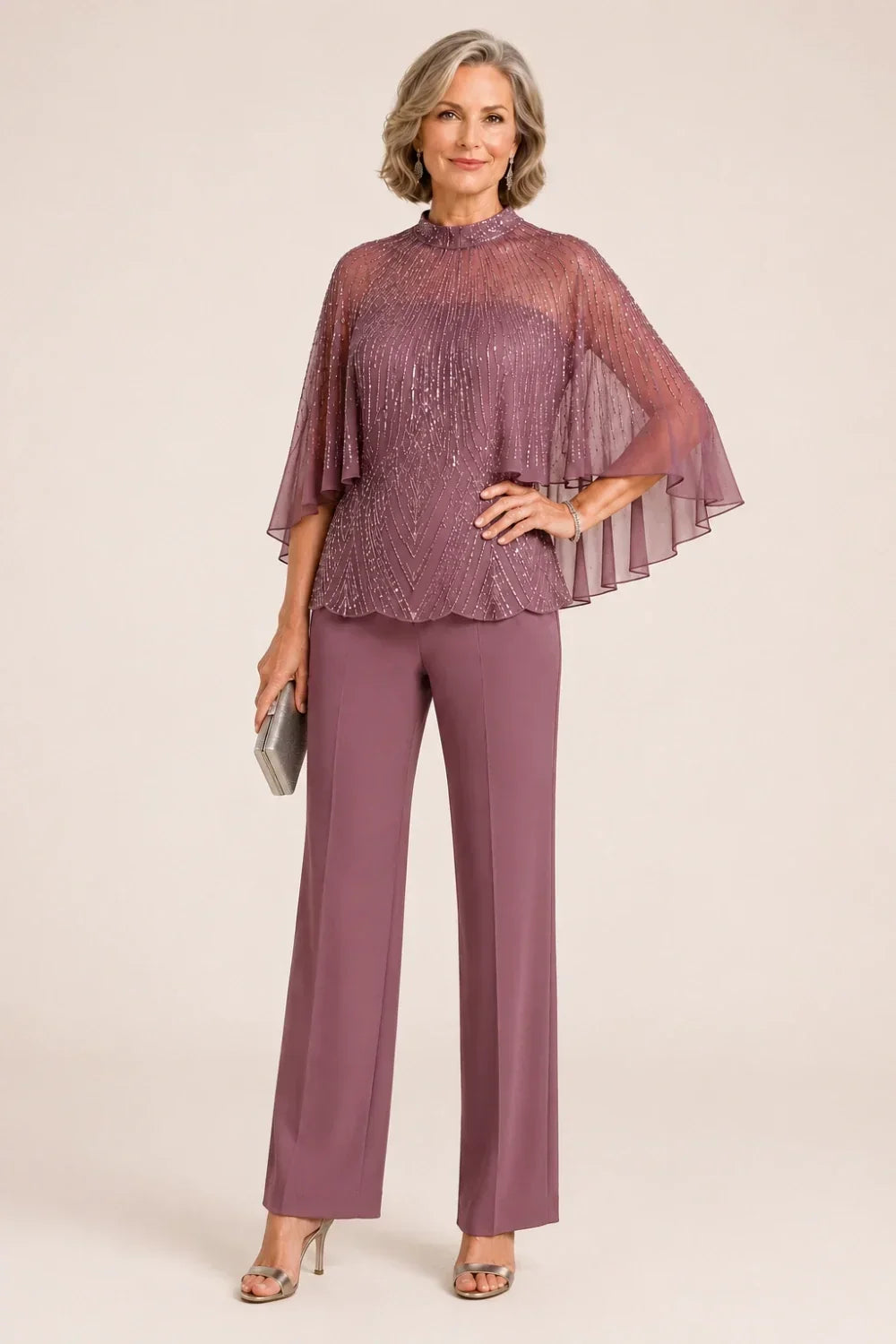 Completo pantalone con cappa in mesh di paillettes e collo alto