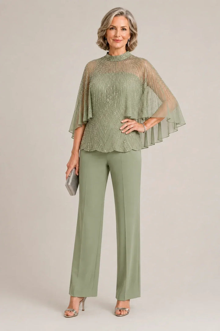 Completo pantalone con cappa in mesh di paillettes e collo alto