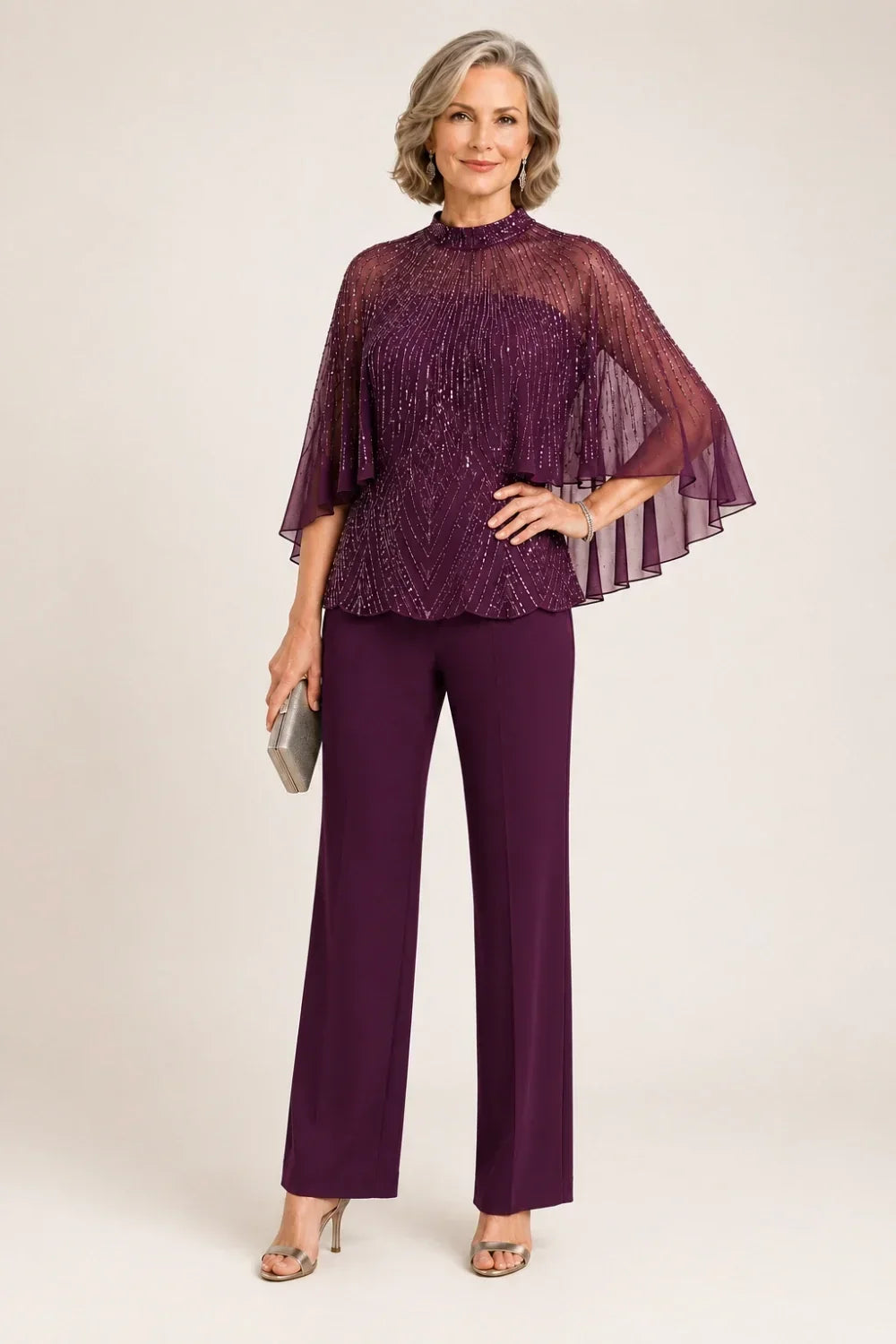 Completo pantalone con cappa in mesh di paillettes e collo alto