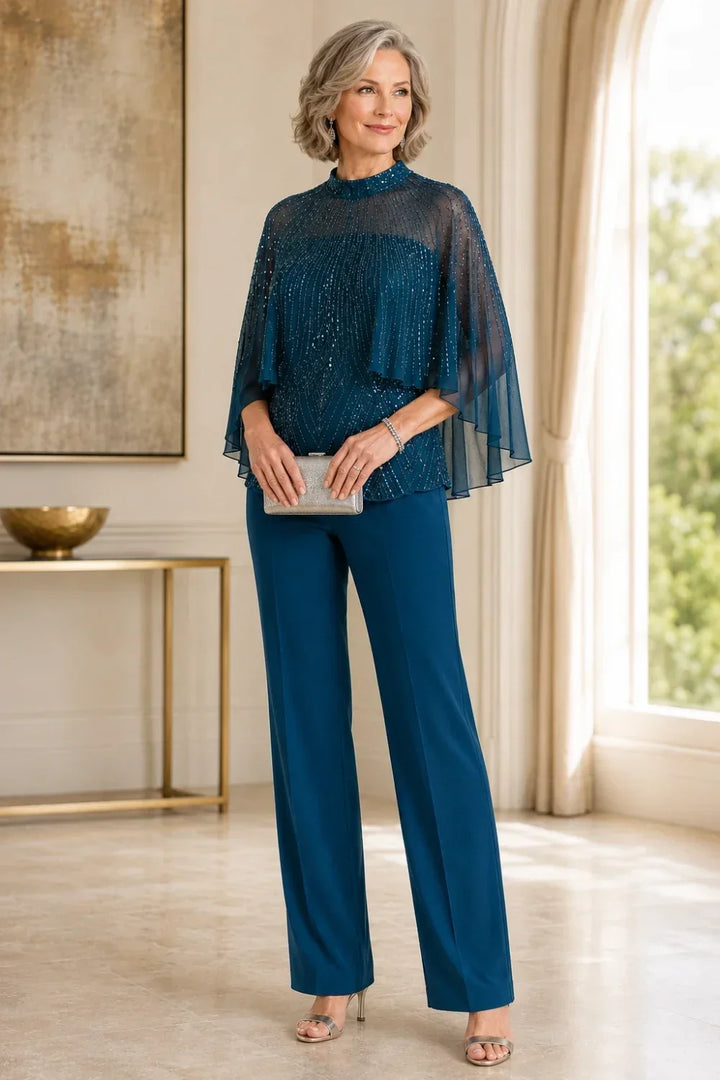 Completo pantalone con cappa in mesh di paillettes e collo alto