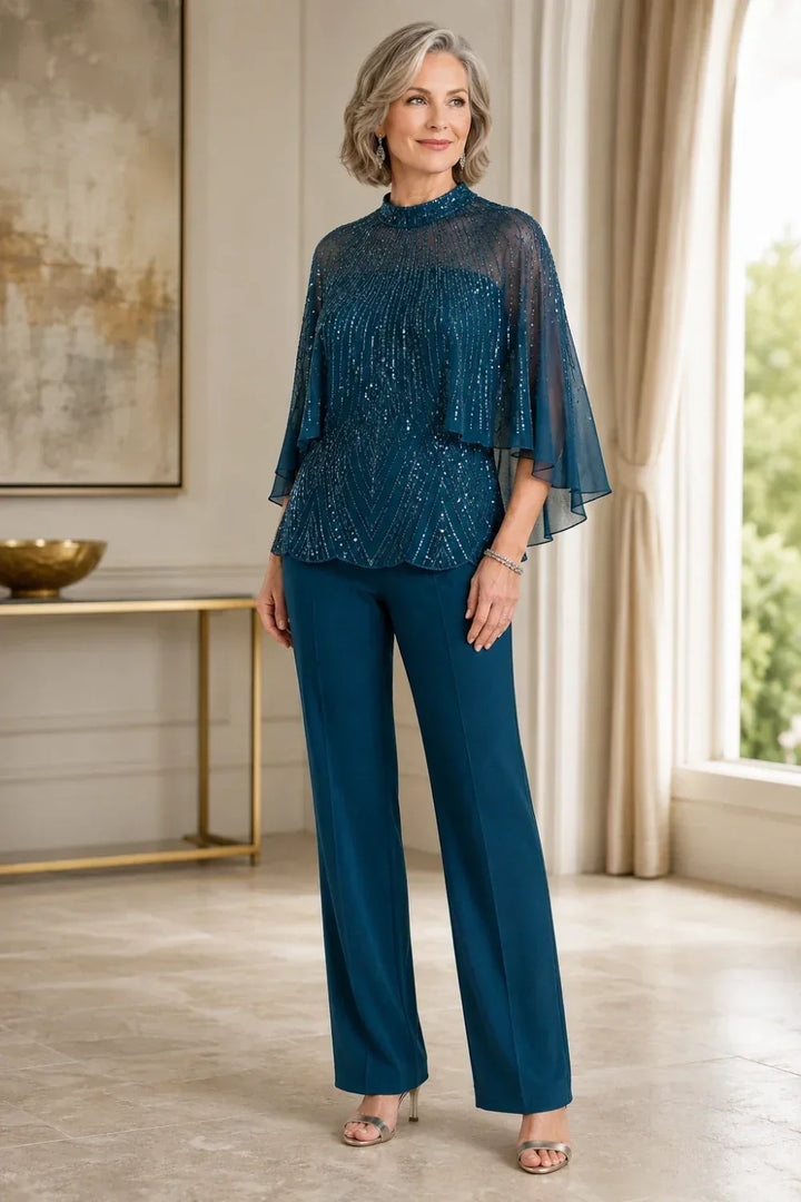 Completo pantalone con cappa in mesh di paillettes e collo alto