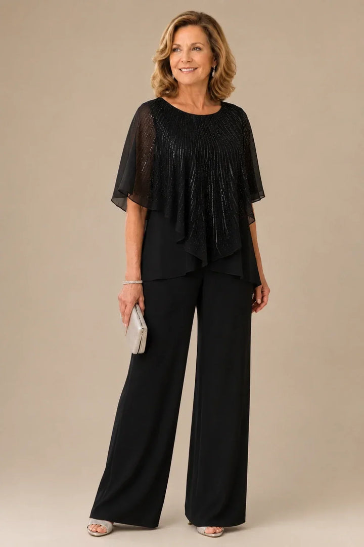Completo pantalone in chiffon con mantellina di paillettes e pantaloni a gamba larga