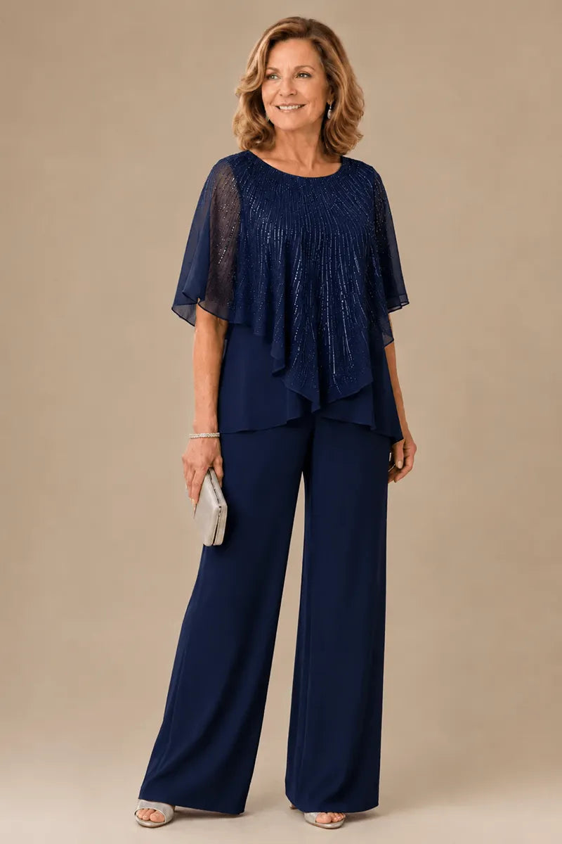 Completo pantalone in chiffon con mantellina di paillettes e pantaloni a gamba larga