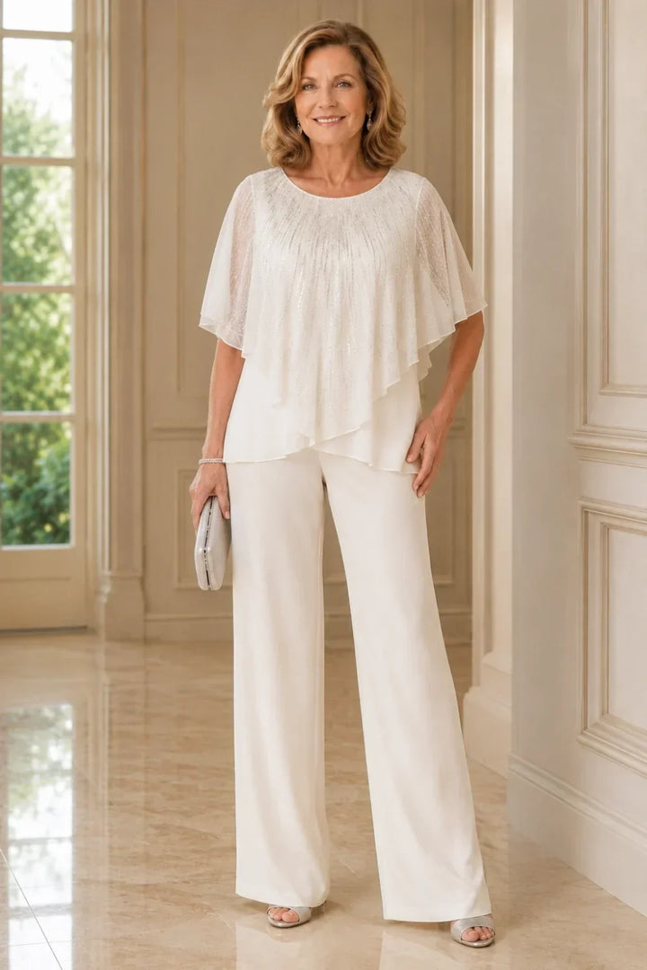 Completo pantalone in chiffon con mantellina di paillettes e pantaloni a gamba larga