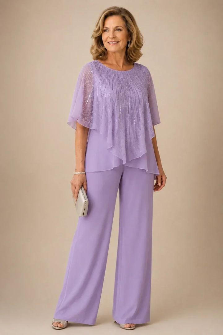 Completo pantalone in chiffon con mantellina di paillettes e pantaloni a gamba larga