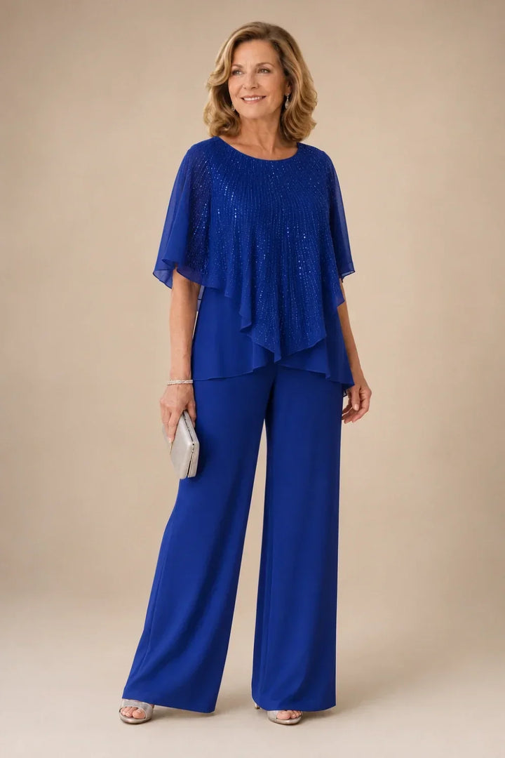 Completo pantalone in chiffon con mantellina di paillettes e pantaloni a gamba larga