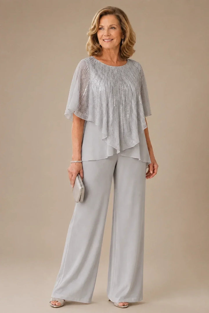 Completo pantalone in chiffon con mantellina di paillettes e pantaloni a gamba larga
